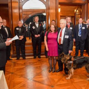man and wife with seeing eye dog