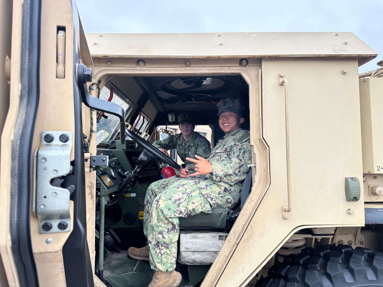 Jared Tam and Patrick Ford in humvee