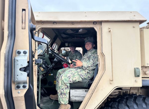 Jared Tam and Patrick Ford in humvee