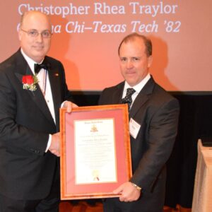 two men holding certificate