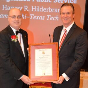 two men holding certificate